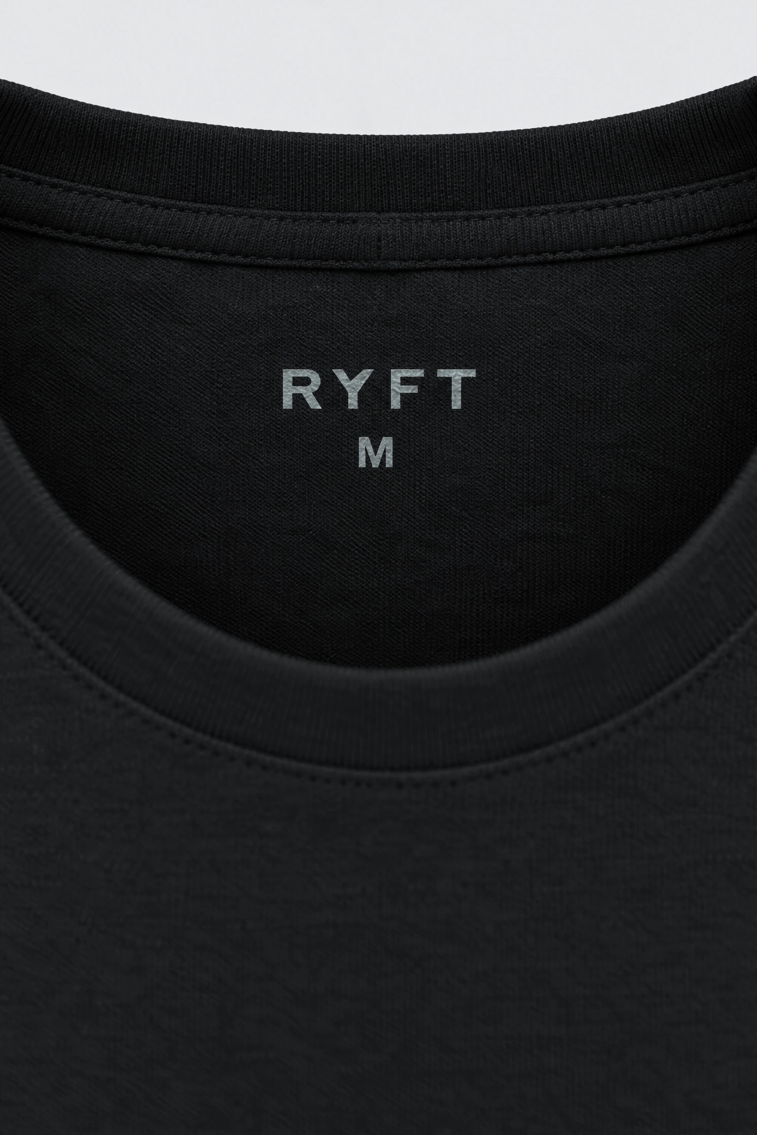 Obsidian Training Tee in Onyx, inside neck print detail