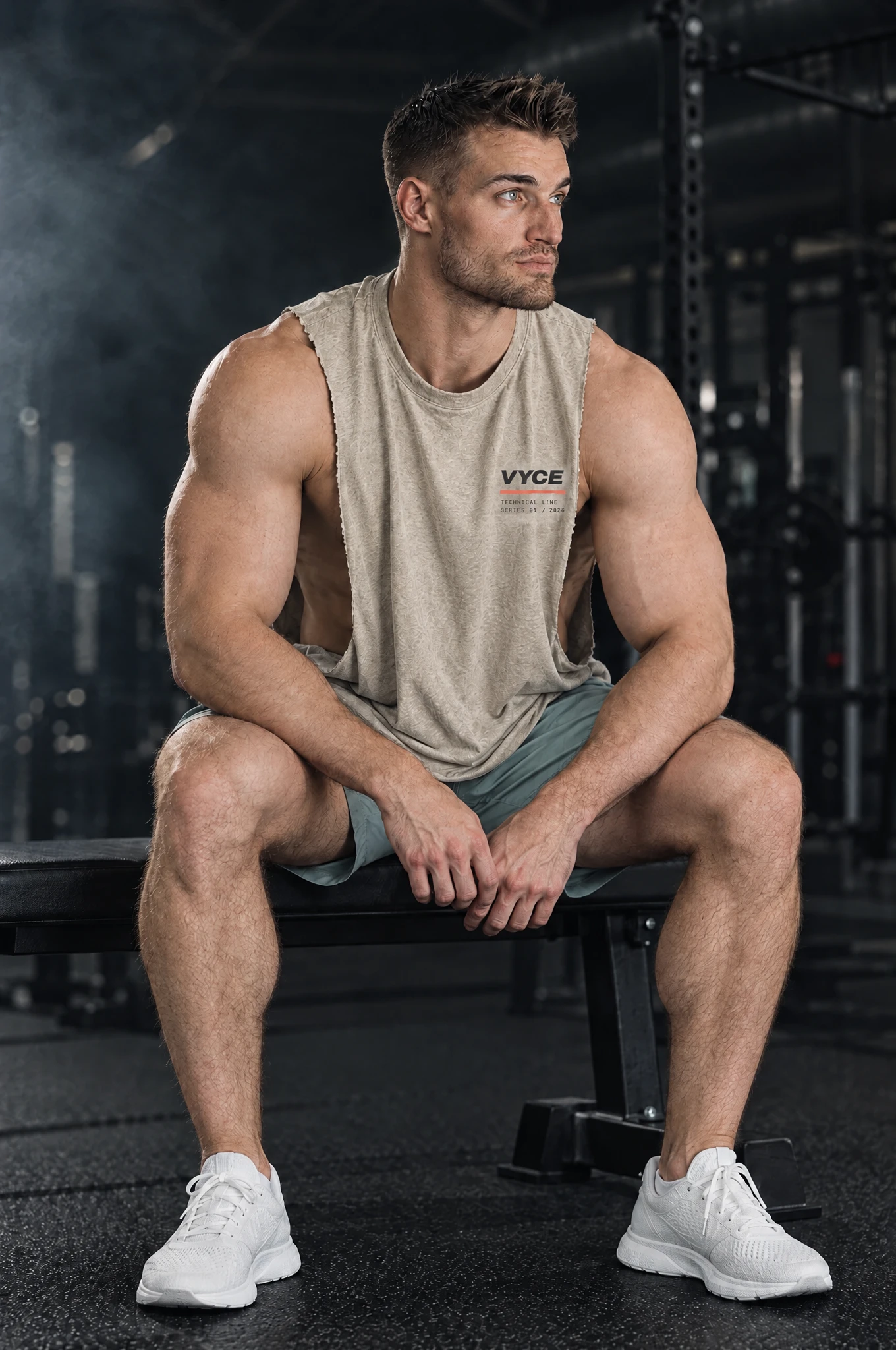 Kyle wearing the Stone Spec Cutoff, seated on a bench
