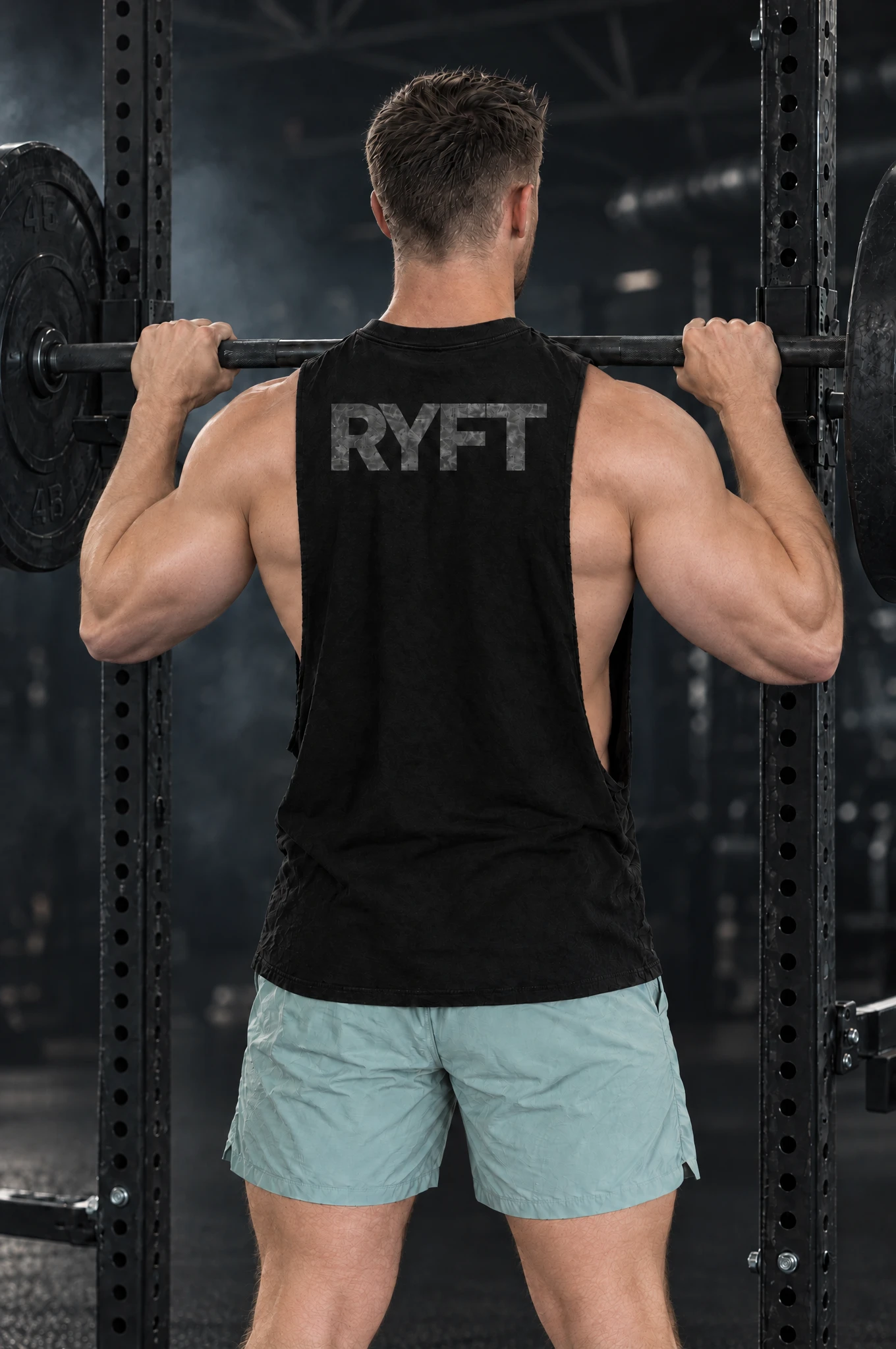 Campus Cutoff in Black, worn by model, back view at the squat rack